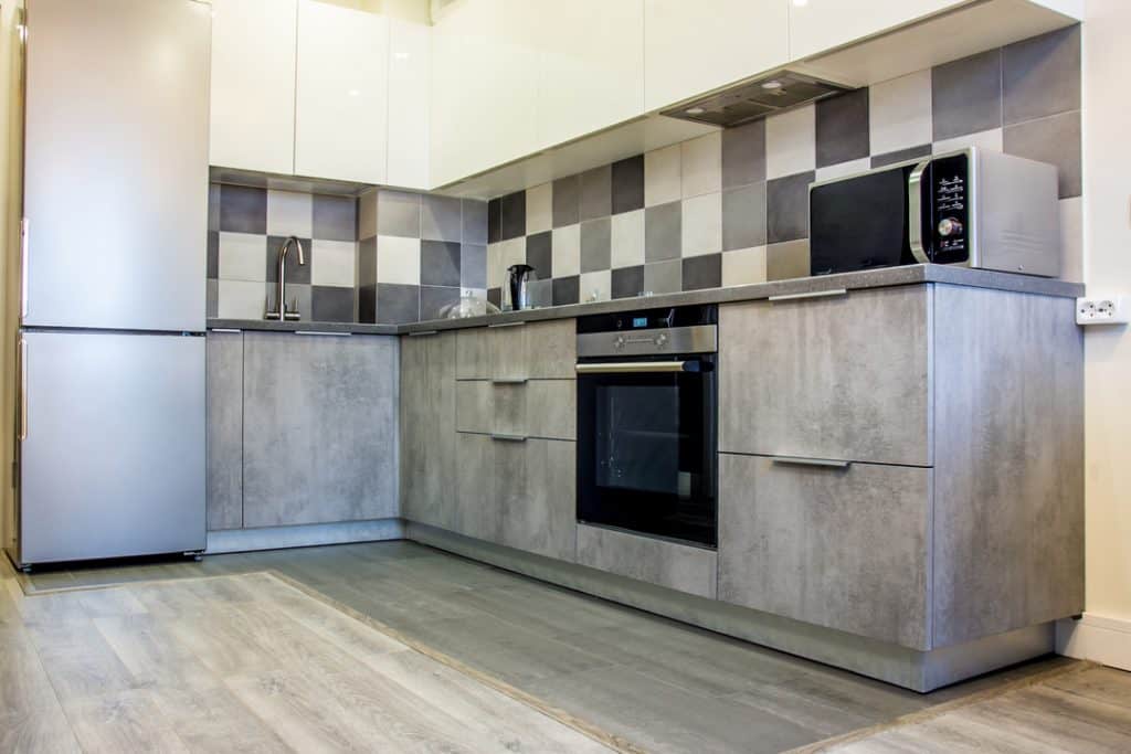 photo of a gray kitchen toe kick cabinet