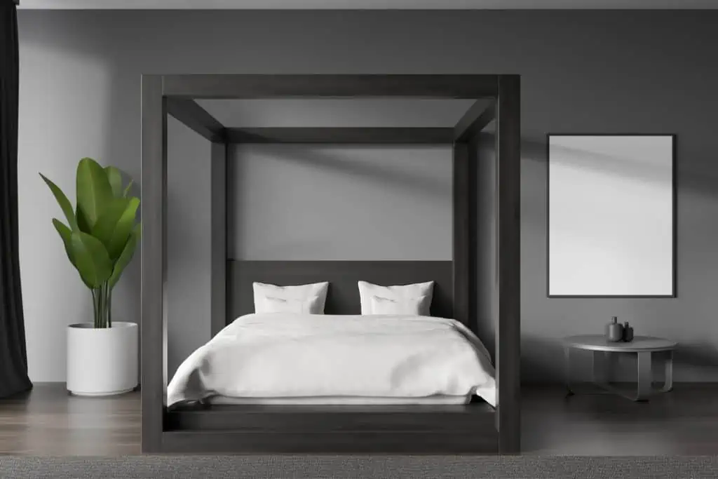 photo of a black canopy bed metal frame design