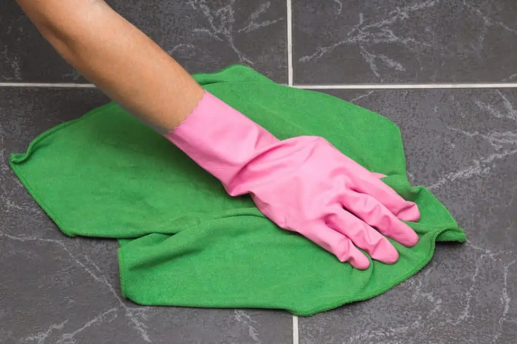how to clean 1950s floor tiles with gloves and cloth