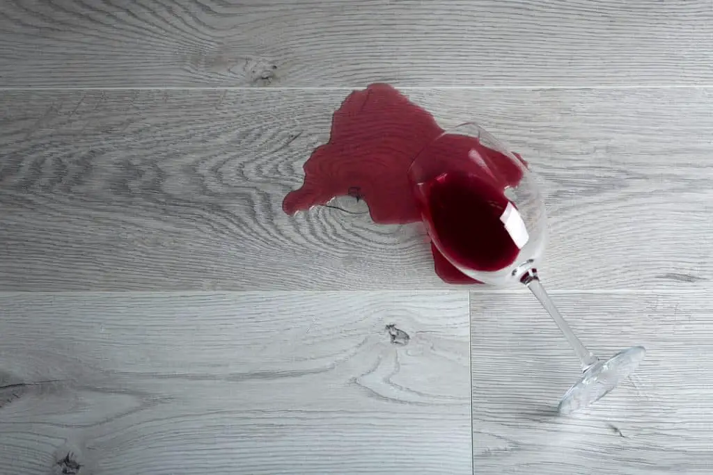 how to get alcohol stains out of wood