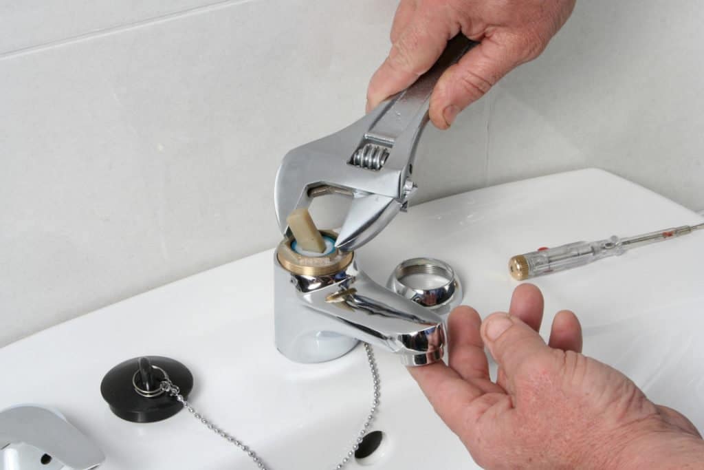 how to remove a stuck faucet nut