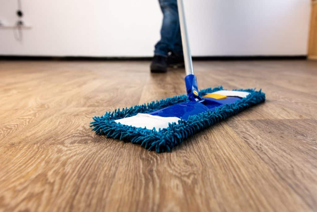 sweep floor to clean drywall dust off wood floors