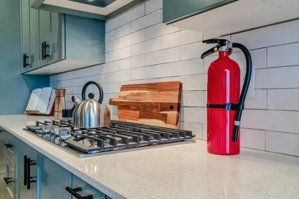 fire extinguisher on white countertop