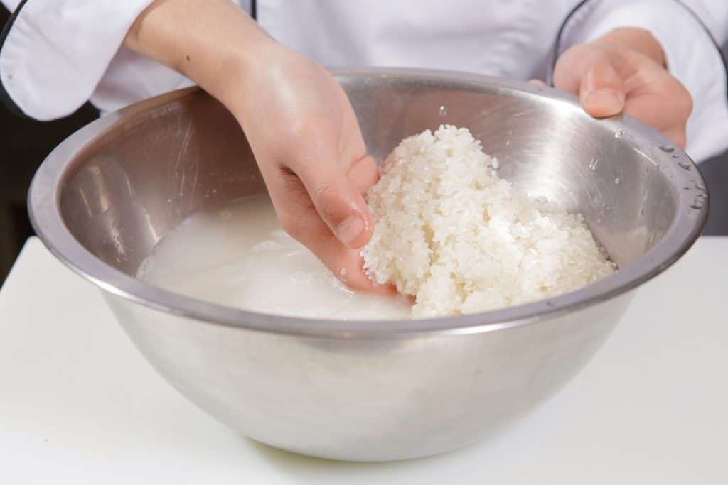 washing rice by hand