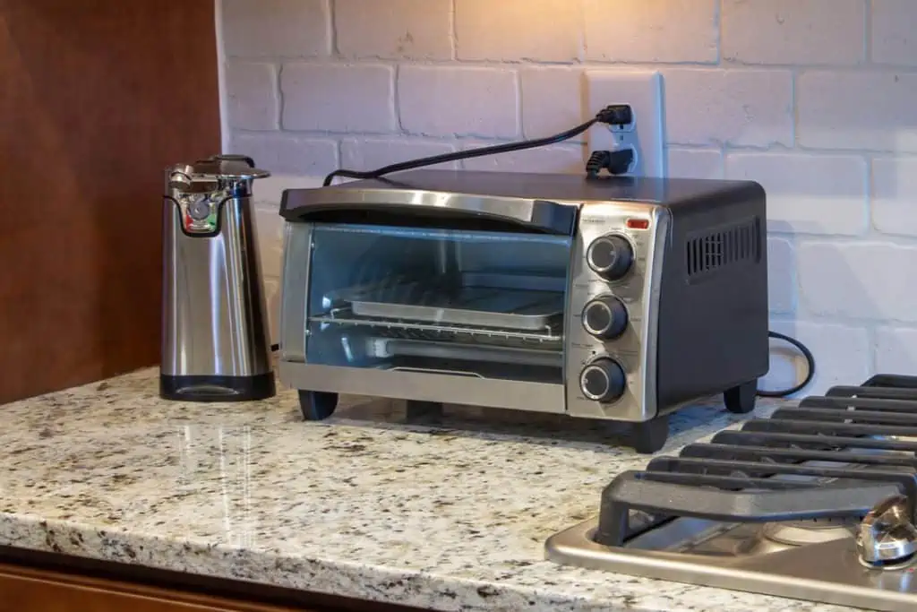 expensive toaster oven next to grill